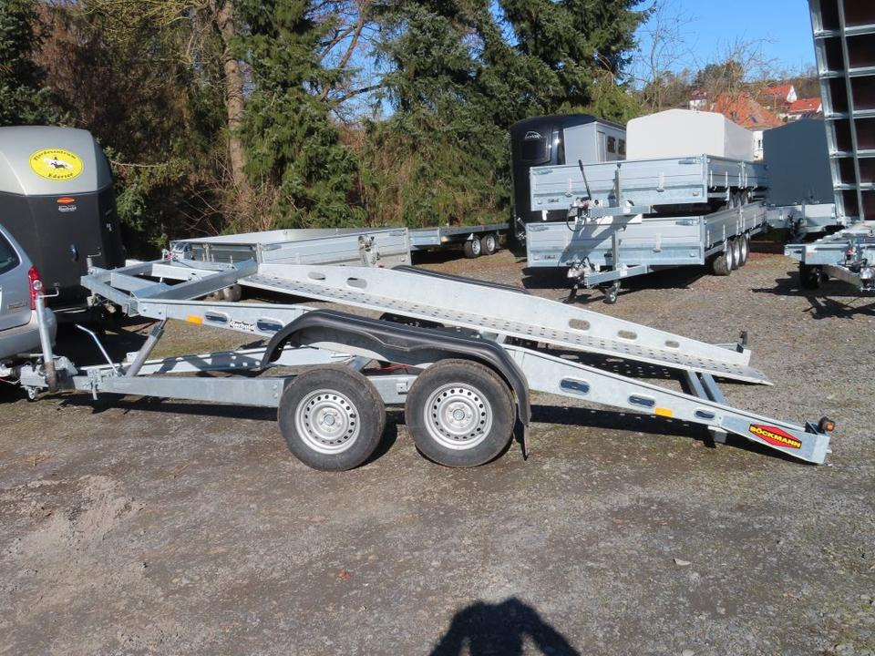 Böckmann, Autotransporter, 2,7 to. kippbar, 100 km, PKW Anhänger - Autotransporter trailer: picture 1 Böckmann, Autotransporter, 2,7 to. kippbar, 100 km, PKW Anhänger - Autotransporter trailer: picture 1