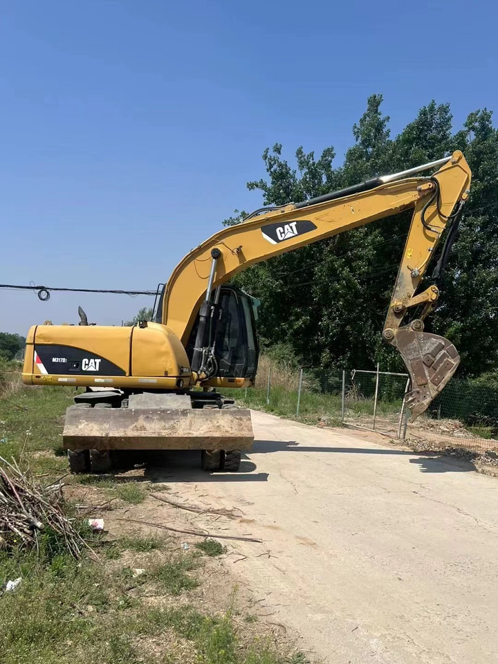 CATERPILLAR M317 - Wheel excavator: picture 1 CATERPILLAR M317 - Wheel excavator: picture 1