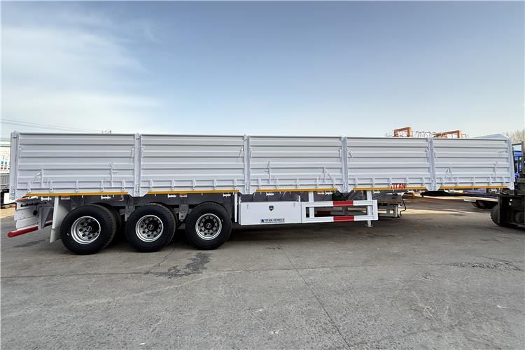 New Dropside/ Flatbed semi-trailer for transportation of bulk materials TITAN 2025 New 60 Ton Dropside Wall Trailer for Sale In Zimbabwe: picture 5