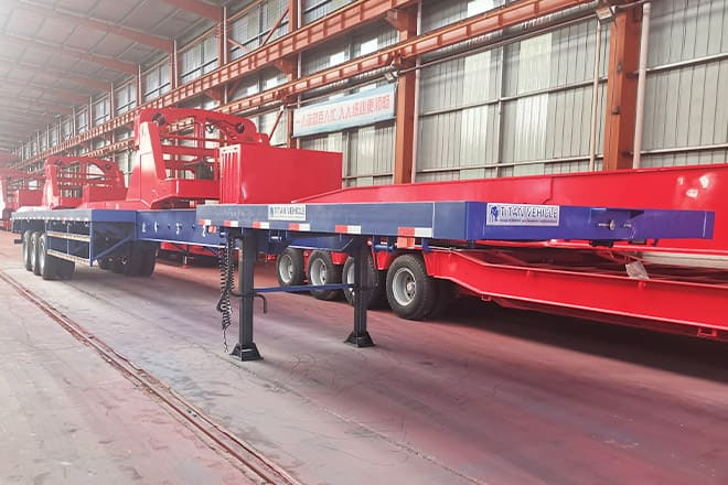 TITAN 3 Axle Extendable Flatbed Trailers for Sale in Angola - Dropside/ Flatbed semi-trailer: picture 3 TITAN 3 Axle Extendable Flatbed Trailers for Sale in Angola - Dropside/ Flatbed semi-trailer: picture 3