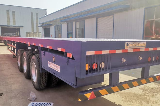 TITAN 3 Axle Extendable Flatbed Trailers for Sale in Angola - Dropside/ Flatbed semi-trailer: picture 2 TITAN 3 Axle Extendable Flatbed Trailers for Sale in Angola - Dropside/ Flatbed semi-trailer: picture 2