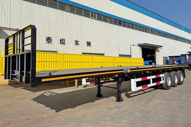 TITAN Tri Axle Flatbed Trailer for Sale in Jamaica - Dropside/ Flatbed semi-trailer: picture 1 TITAN Tri Axle Flatbed Trailer for Sale in Jamaica - Dropside/ Flatbed semi-trailer: picture 1