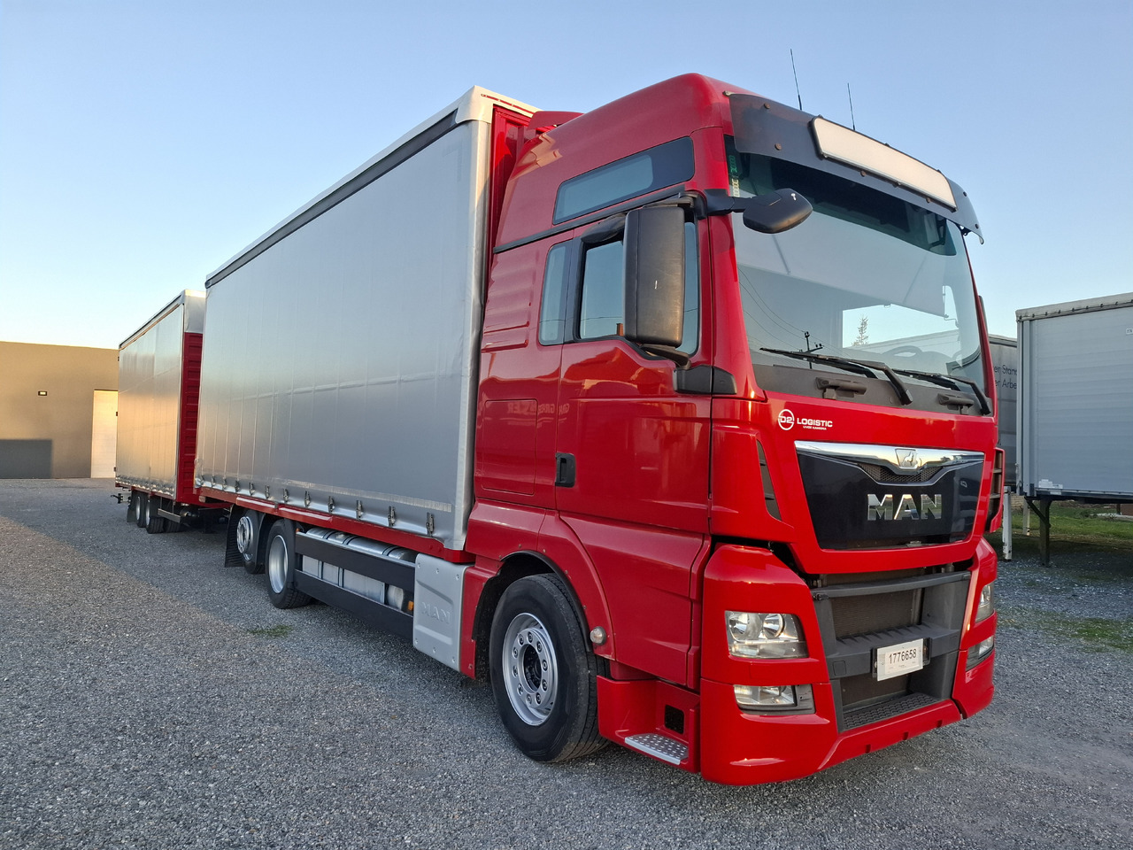 MAN TGX 26.440 E6 + SCHMITZ - Curtainsider truck: picture 4 MAN TGX 26.440 E6 + SCHMITZ - Curtainsider truck: picture 4