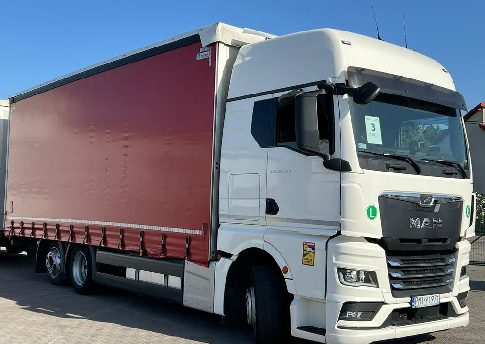 MAN TGX 26.470 z przyczepą Redos - Curtainsider truck: picture 3 MAN TGX 26.470 z przyczepą Redos - Curtainsider truck: picture 3