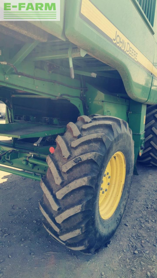 Combine harvester John Deere W540: picture 17