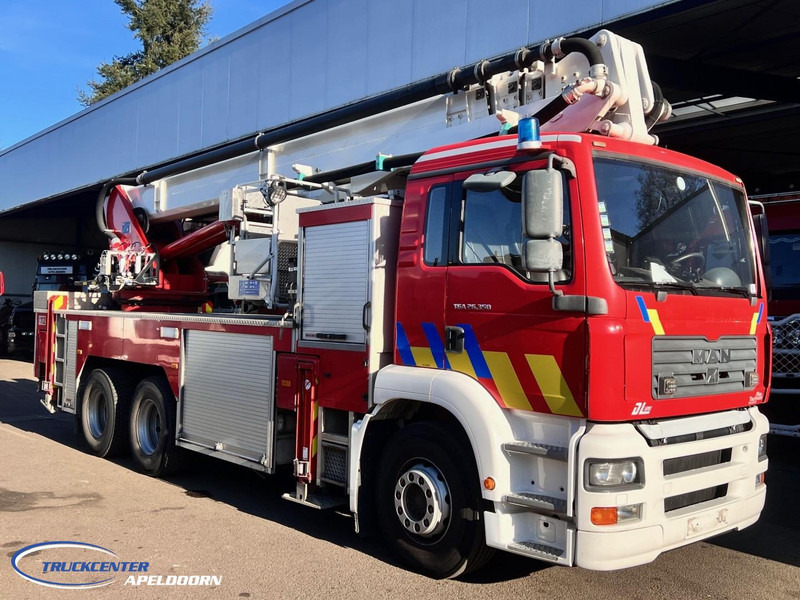 MAN TGA 26.350 Magirus ALP 320L = 32 meter, Waterpomp, 6x4, Bladgeveerd - Fire truck: picture 3 MAN TGA 26.350 Magirus ALP 320L = 32 meter, Waterpomp, 6x4, Bladgeveerd - Fire truck: picture 3