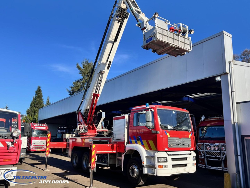 MAN TGA 26.350 Magirus ALP 320L = 32 meter, Waterpump, 6x4, Steel springs - Truck: picture 2 MAN TGA 26.350 Magirus ALP 320L = 32 meter, Waterpump, 6x4, Steel springs - Truck: picture 2