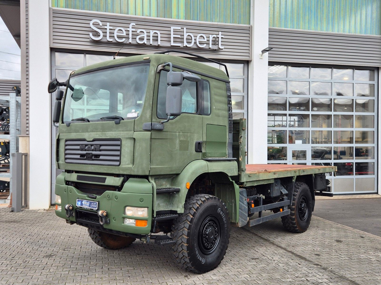 MAN TGA 18.360 4x4 BB Pritsche Single Bereifung - Dropside/ Flatbed truck: picture 1 MAN TGA 18.360 4x4 BB Pritsche Single Bereifung - Dropside/ Flatbed truck: picture 1