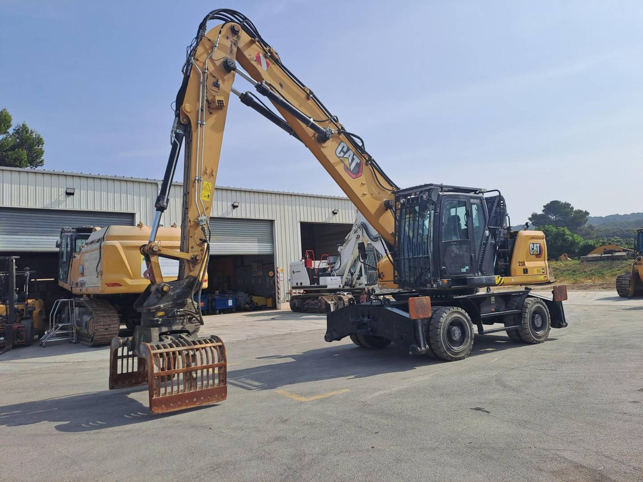 CAT MH3024 - Wheel excavator: picture 1 CAT MH3024 - Wheel excavator: picture 1